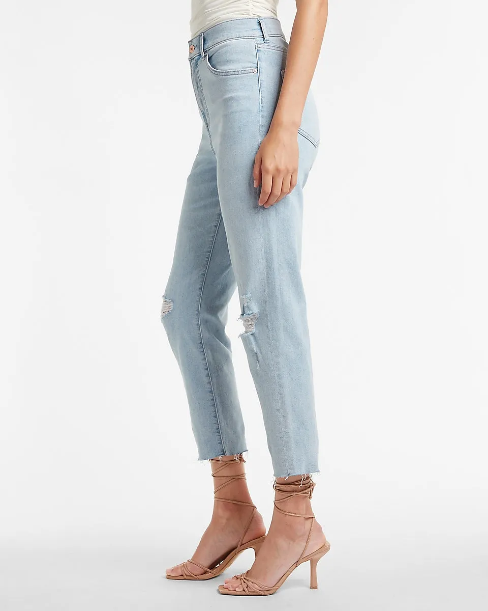 Super High Waisted Ripped Raw Hem Mom Jeans in Light Wash