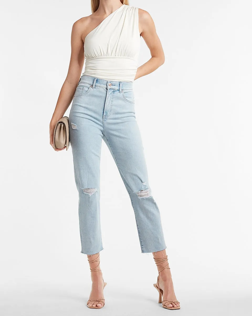 Super High Waisted Ripped Raw Hem Mom Jeans in Light Wash